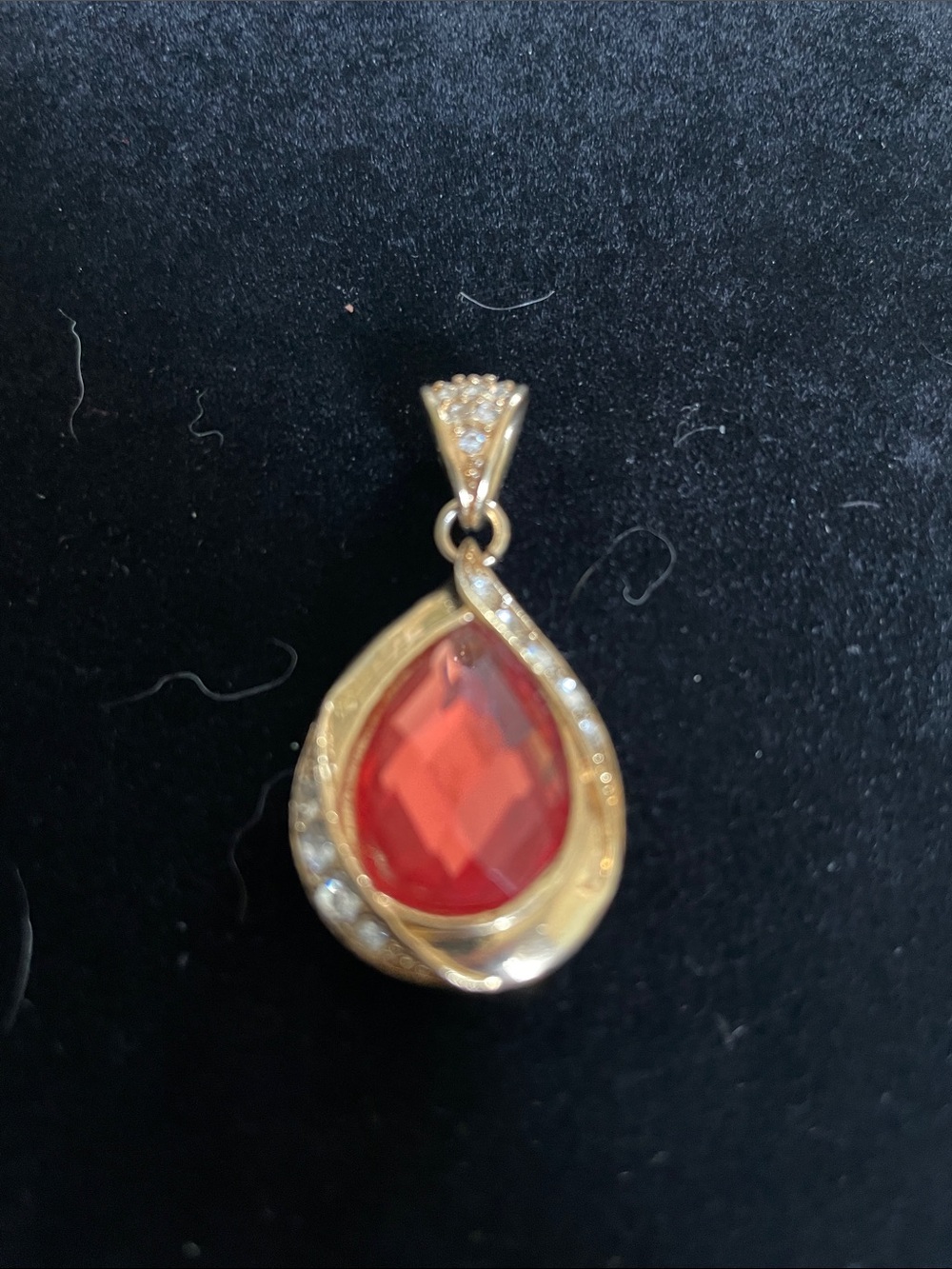 Gold Teardrop Pendant with Red Faceted Stone. 8/21/6